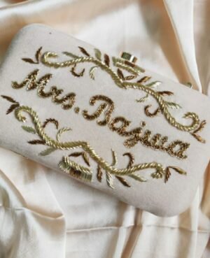 Customized embroidered white silk clutches