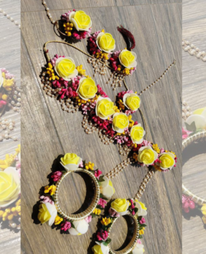 yellow and white haldi heavy floral set with nath