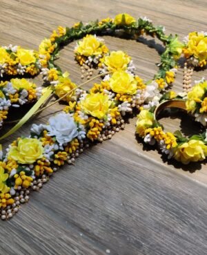 yellow haldi heavy floral set with tiara and bajuband