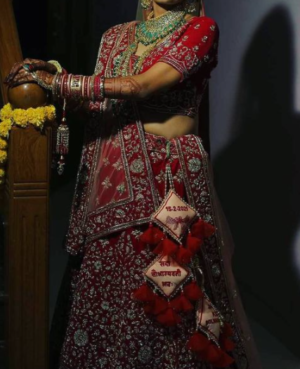 3 layered red lehenga latkan for bride